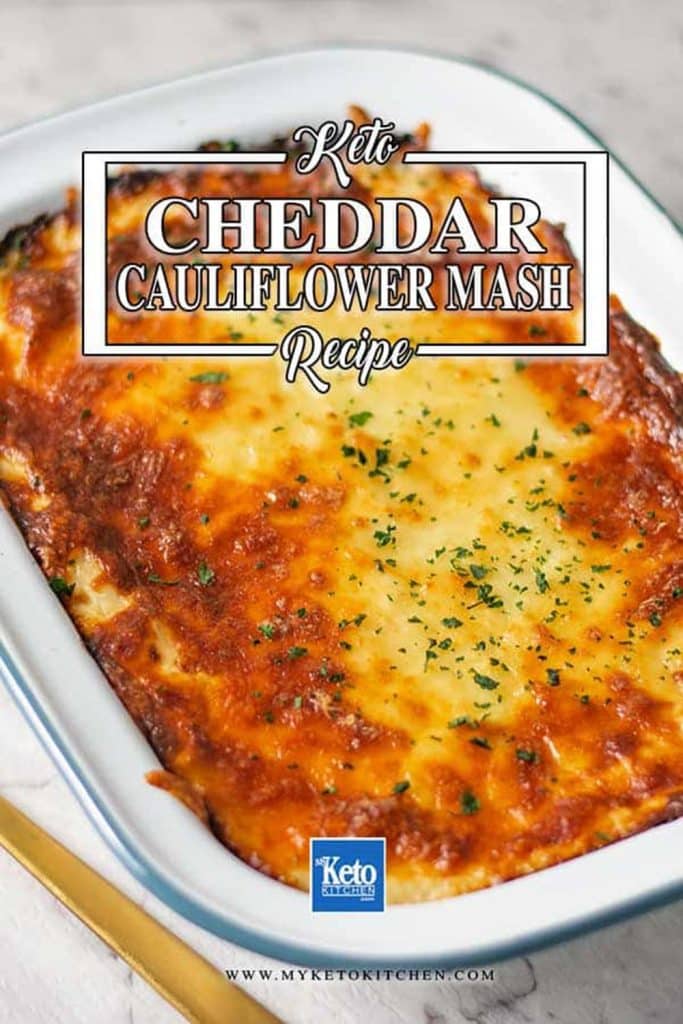 Keto cheesy cauliflower mash in a baking dish fresh from the oven